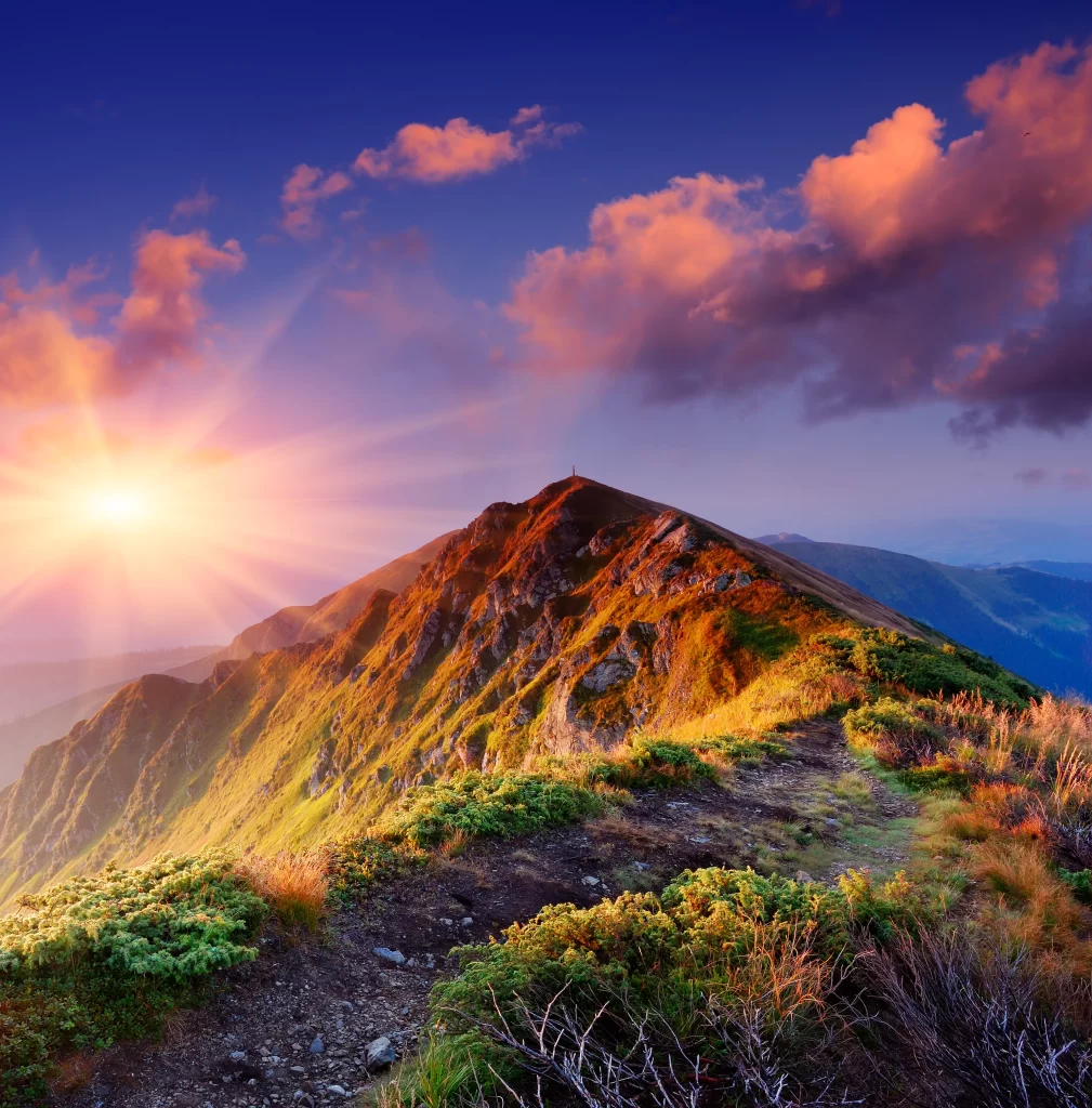 sunset golden vibrant orange green rugged clouds tranquil