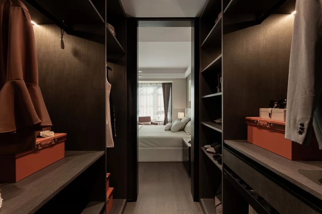 Walk-in Closet Contemporary Dark Wood Neutral Tones Minimalist