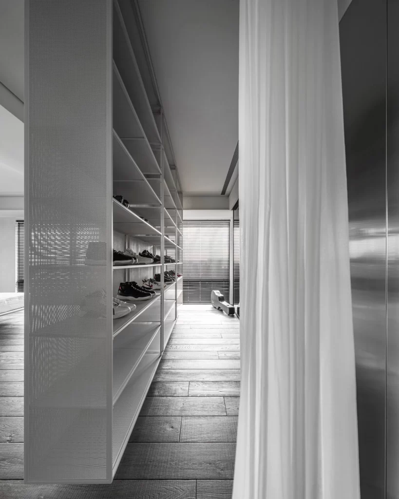 Walk-in Closet Industrial Chic Monochrome Metal Shelving Neutral Tones