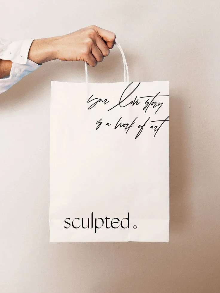 White Paper Bag Black Text Minimalist Artistic Design