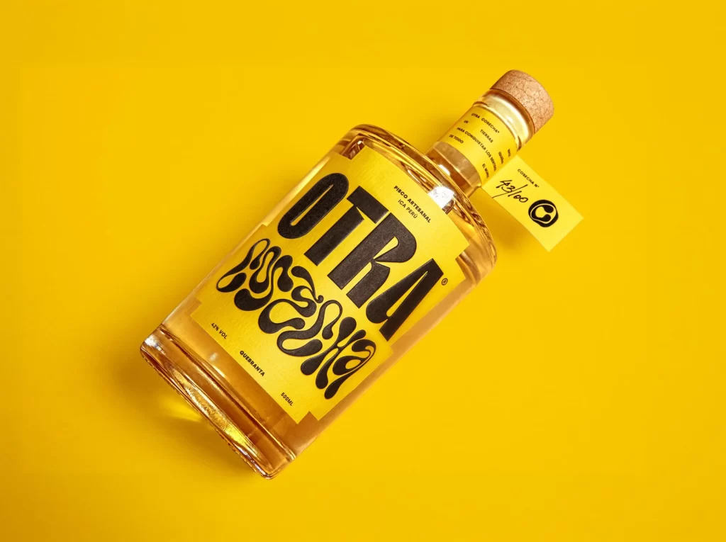 Otra Pisco Transparent Glass Yellow Packaging
