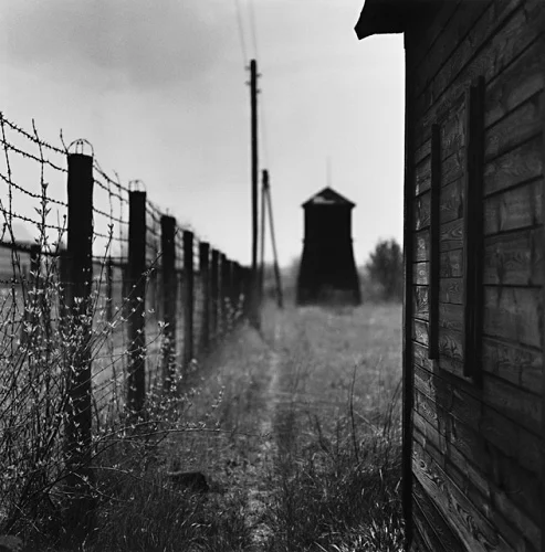 Barbed Wire Fence Tower Wooden Building Dramatic High Contrast Mysterious