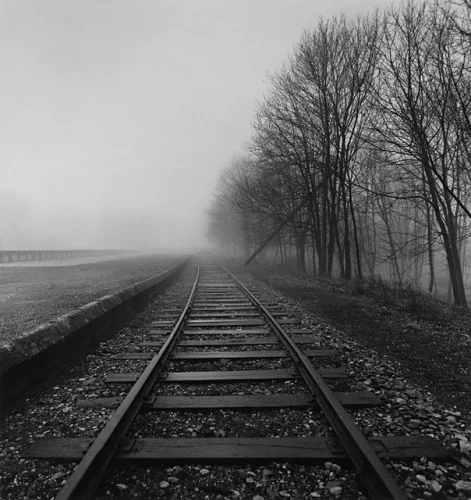 Foggy Railway Track Dramatic Atmospheric Landscape