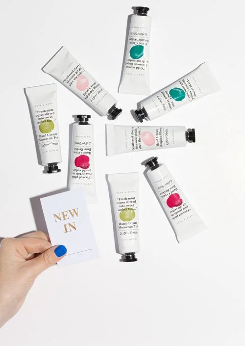 Hand Cream Tube White Black Cap Colorful Design Skincare