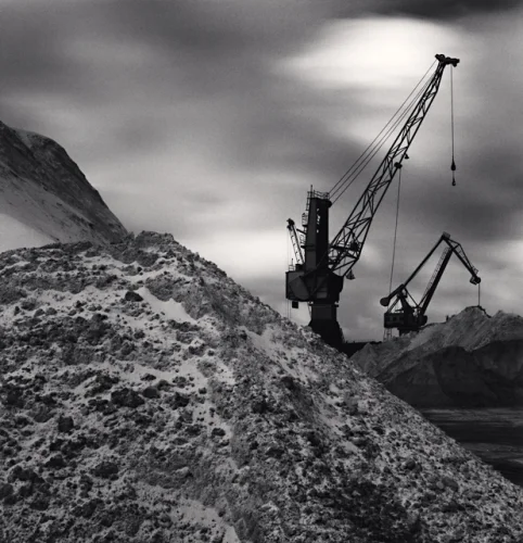 Industrial Landscape Cranes Piles of Material Overcast Sky High Contrast Moody