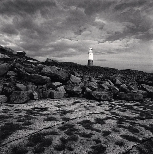 Lighthouse Rocky Terrain Dramatic Cloudy Sky High Contrast Moody