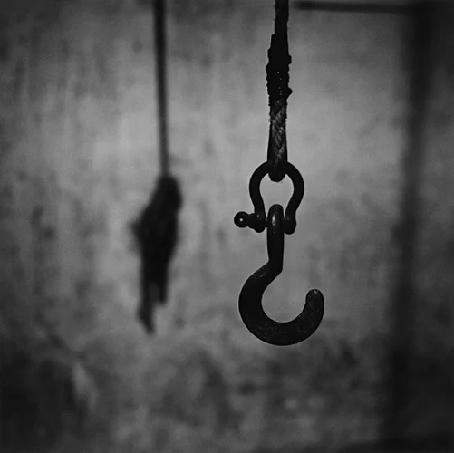 Minimalist High Contrast Mysterious Industrial Hook