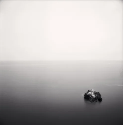 Minimalist Rock Serene Foggy Seascape