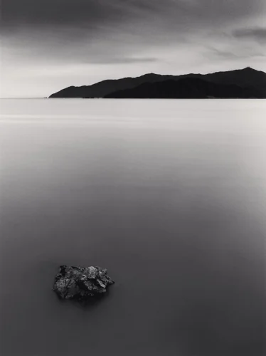 Minimalist Rock Smooth Water Mountains Silhouetted Sky