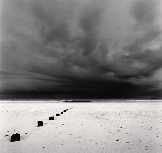 Minimalist Snowy Pathway Dark Clouds Mysterious Atmospheric Landscape