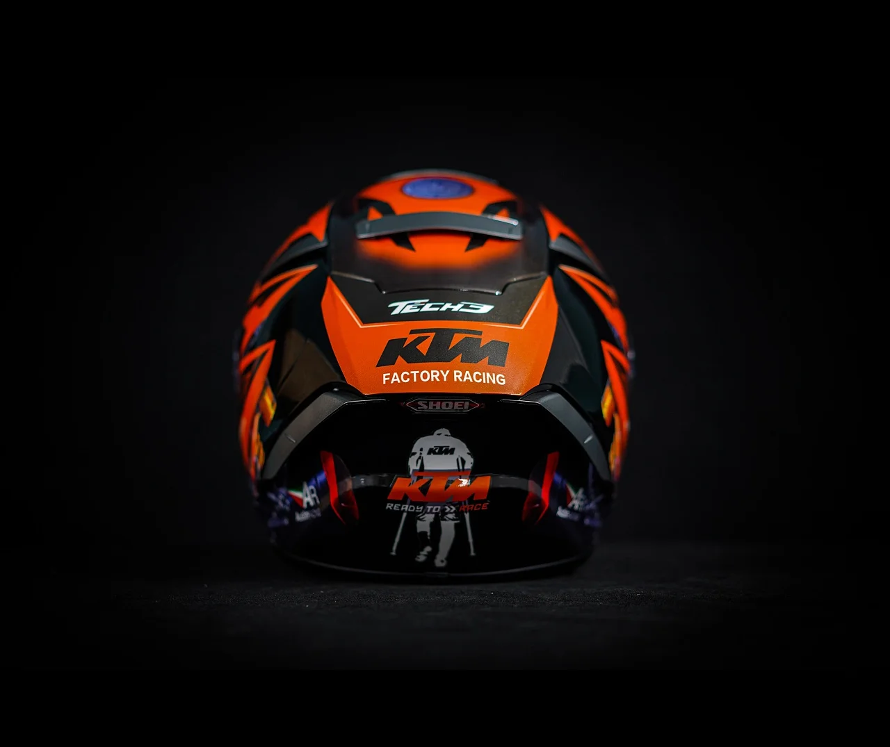 KTM orange and black tiger stripes motorcycle helmet design