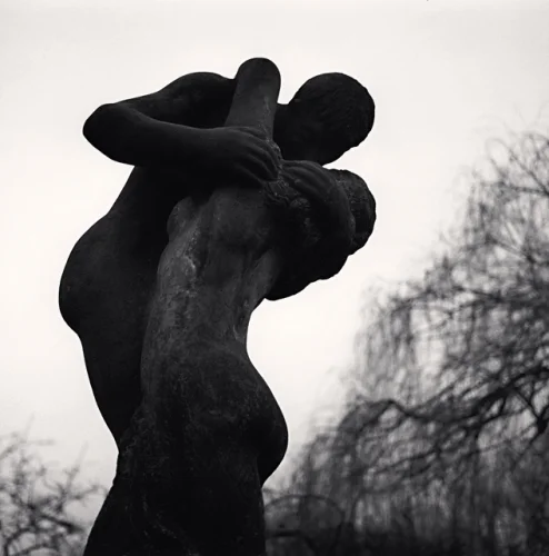 Statue Intimate Embrace Dramatic High Contrast Mysterious