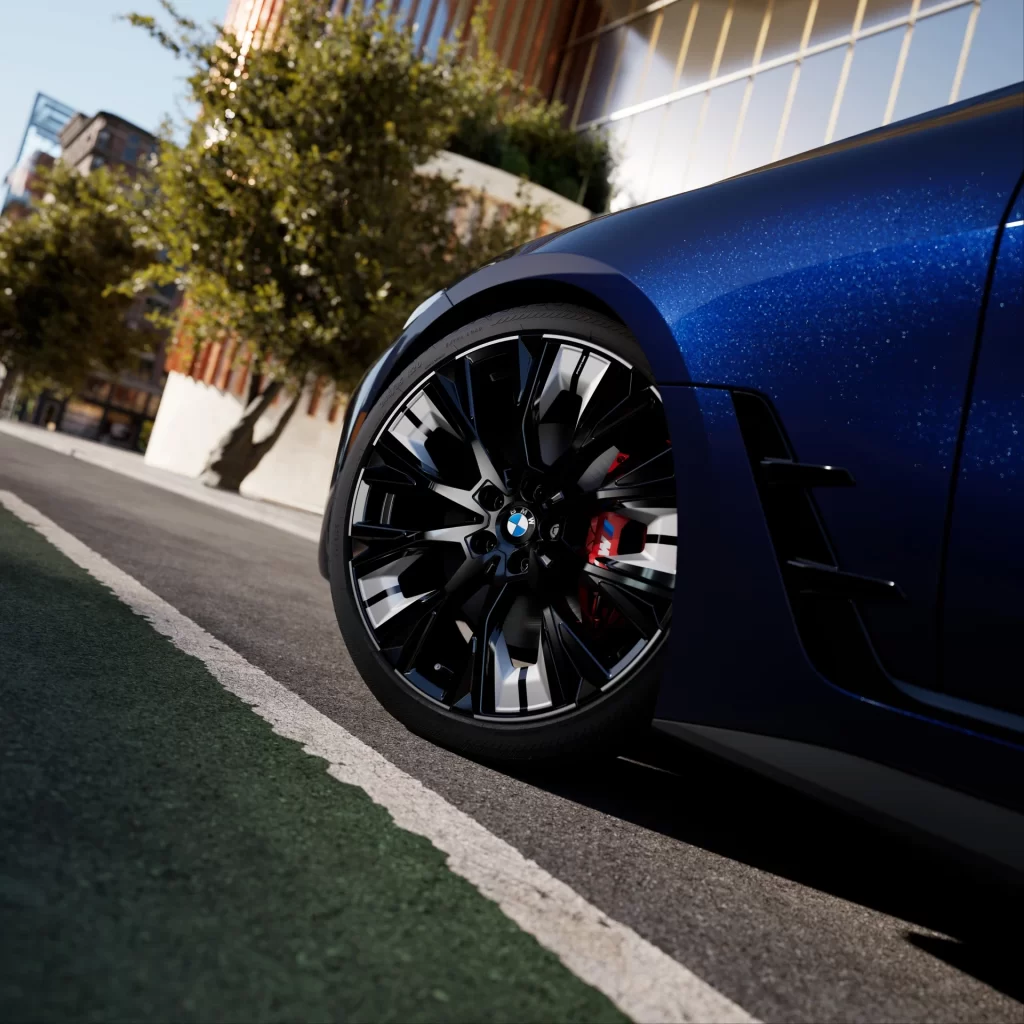 BMW M440i Blue Track Side Dynamic View