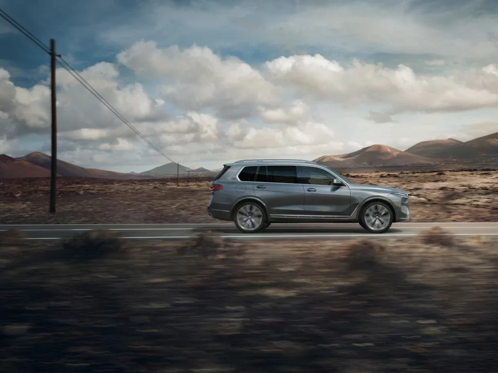 BMW X7 Silver Studio Side Angle View