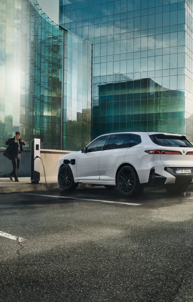 BMW i4 White EV Charging Station View