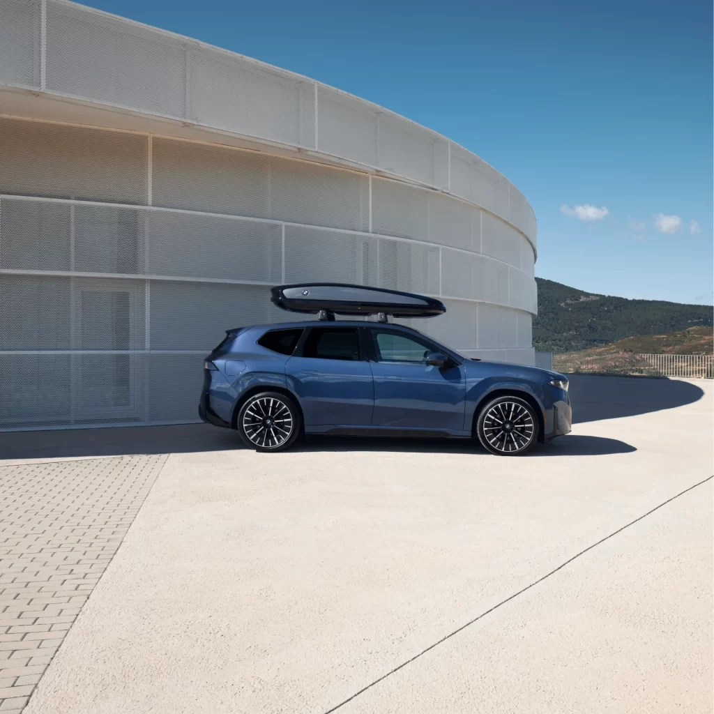 BMW iX Blue Dynamic Side Angle View