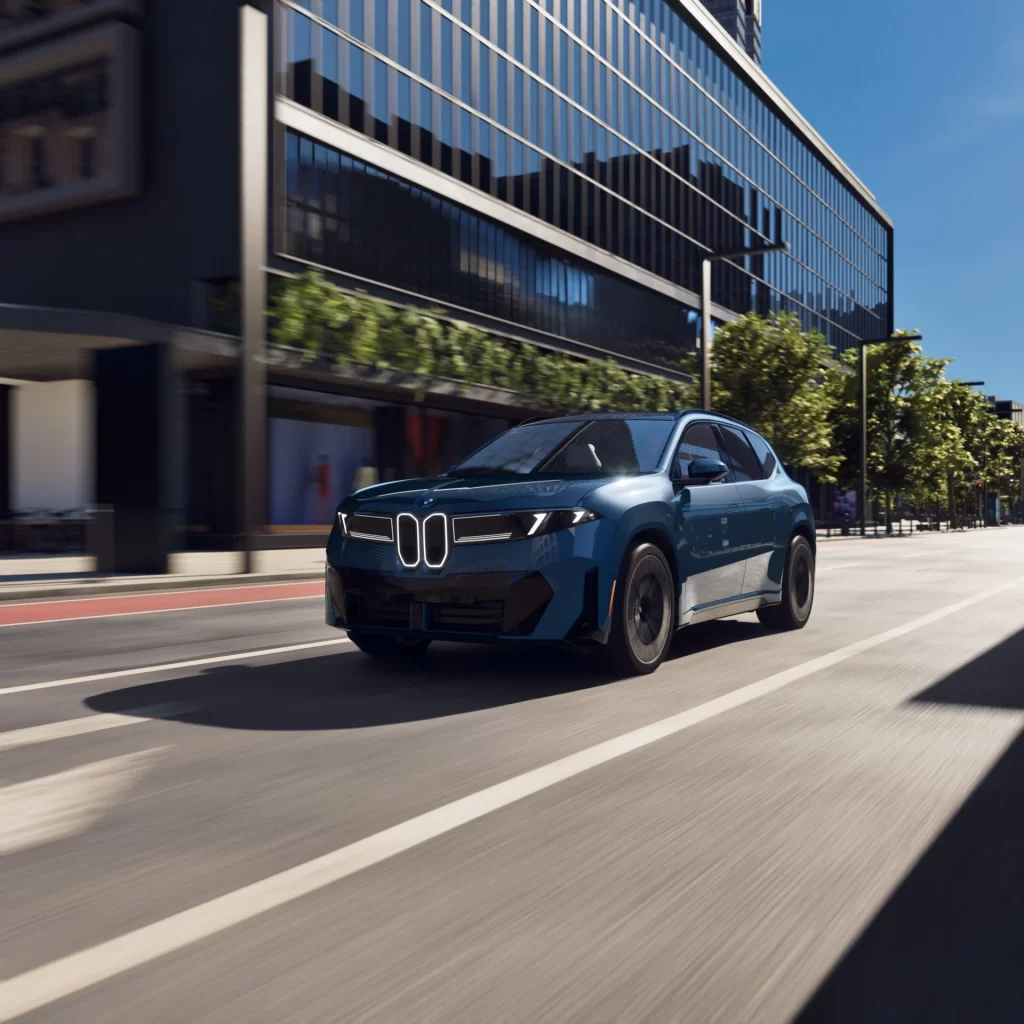 BMW iX Blue Scenic Side Profile Shot
