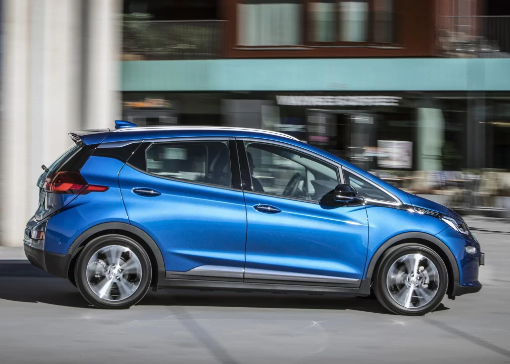 Blue Chevrolet Compact SUV Road Side View
