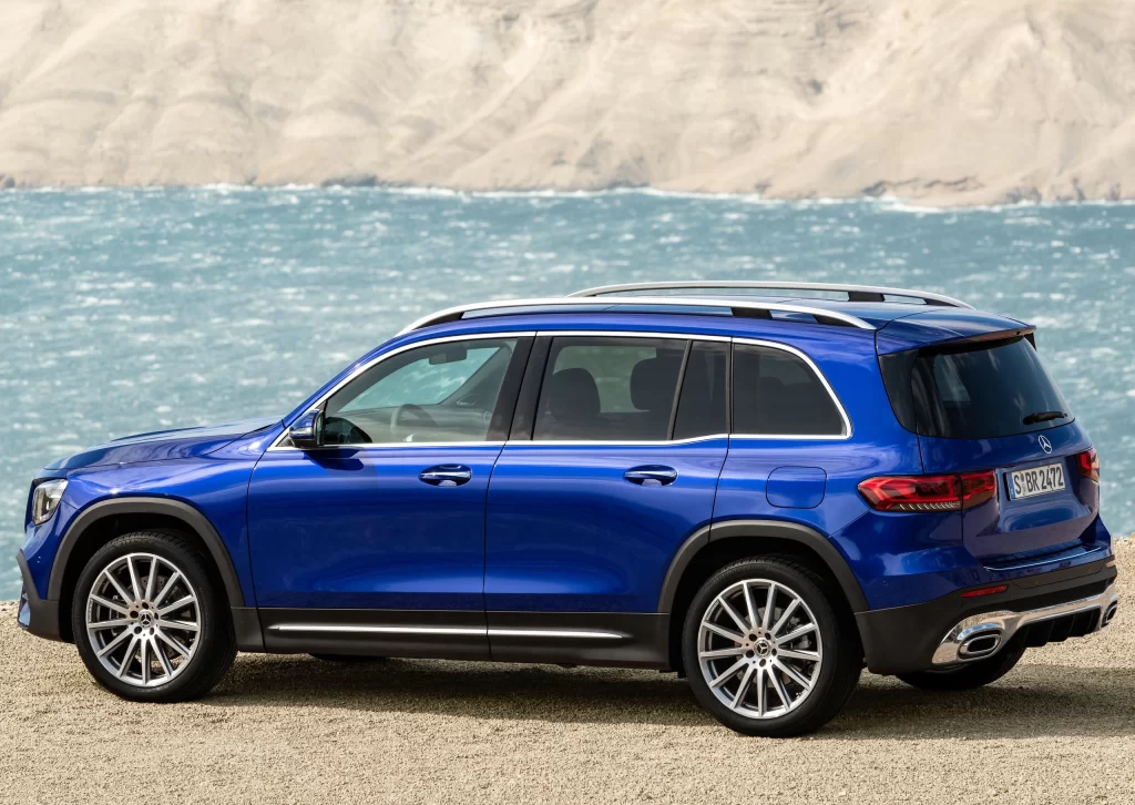 Blue Mercedes SUV Beach Side View