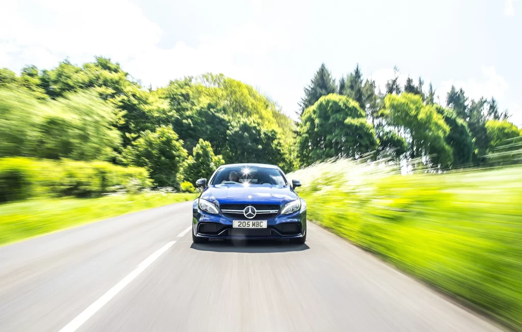 Blue Mercedes Sedan Road Front View
