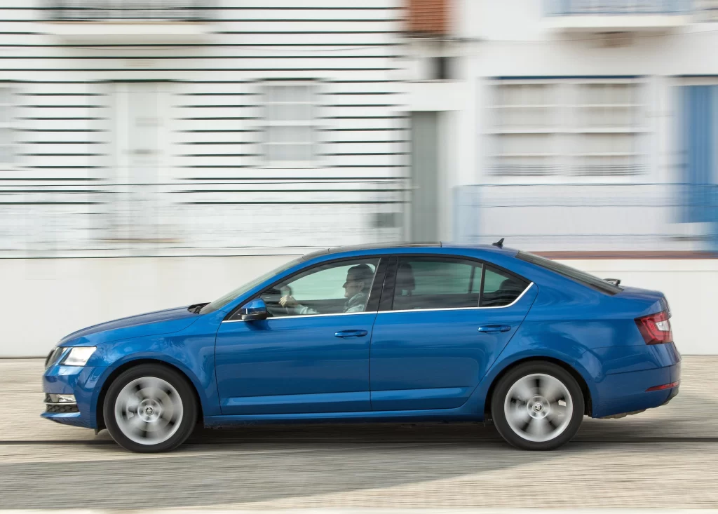 Blue Sedan City Street View