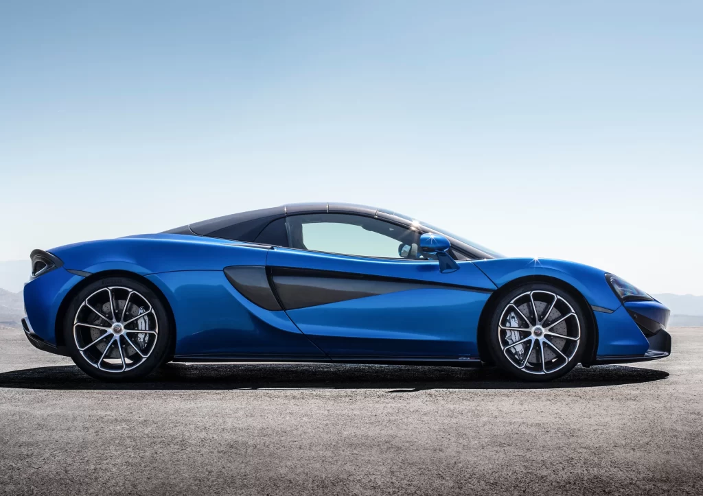Blue Sports Car Tarmac Track Side View