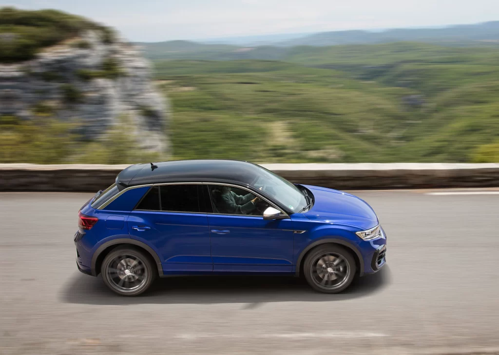 Blue SUV Scenic Road Side View