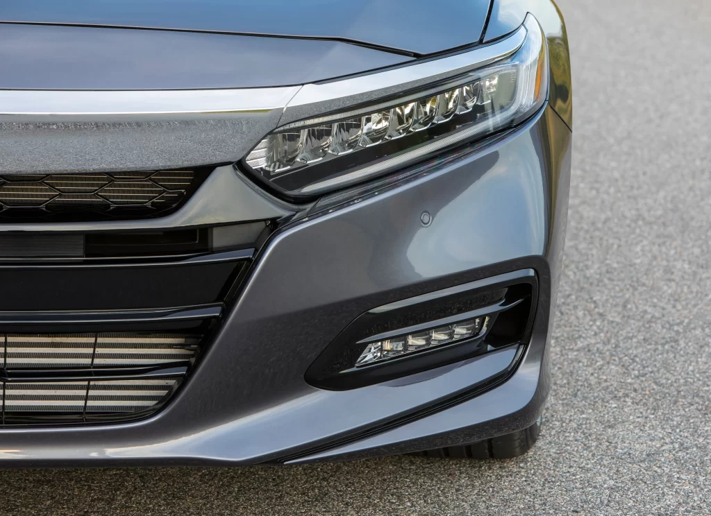 Gray Sedan Headlight Bumper Detail