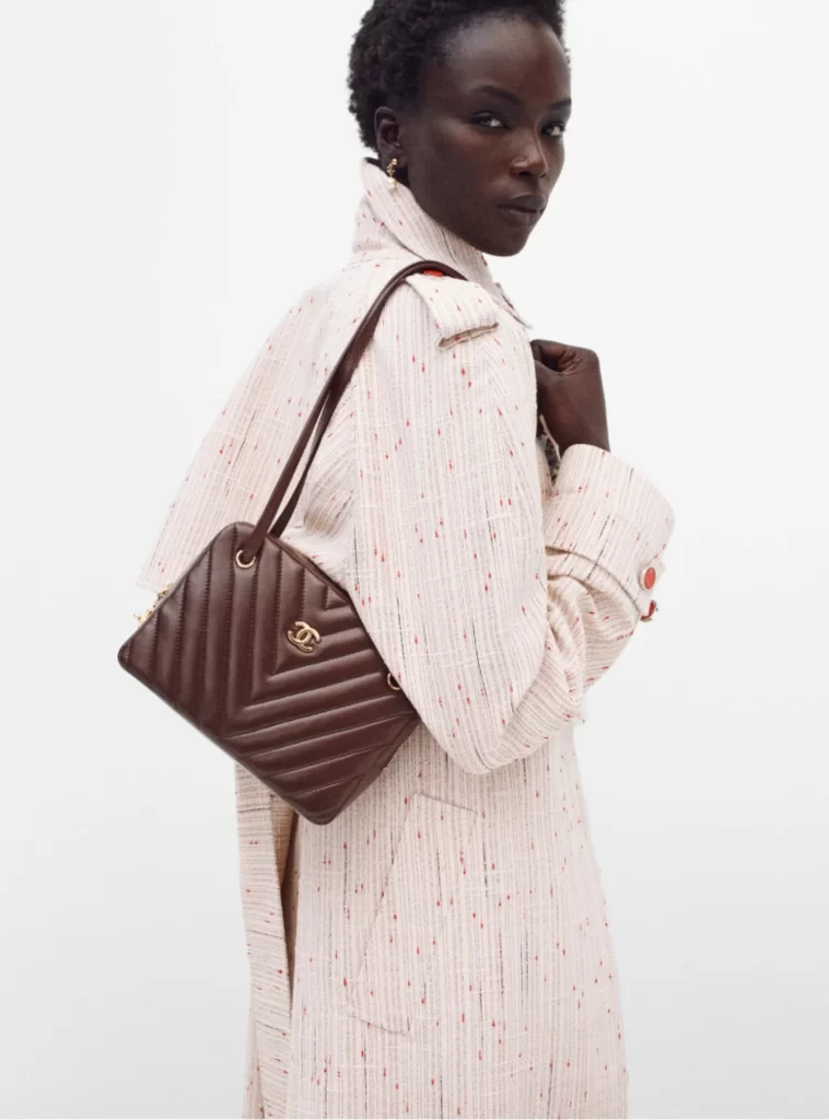 Chanel Fall Winter 2026 Pre Collection Look 5 Coat White and Red Runway Photography