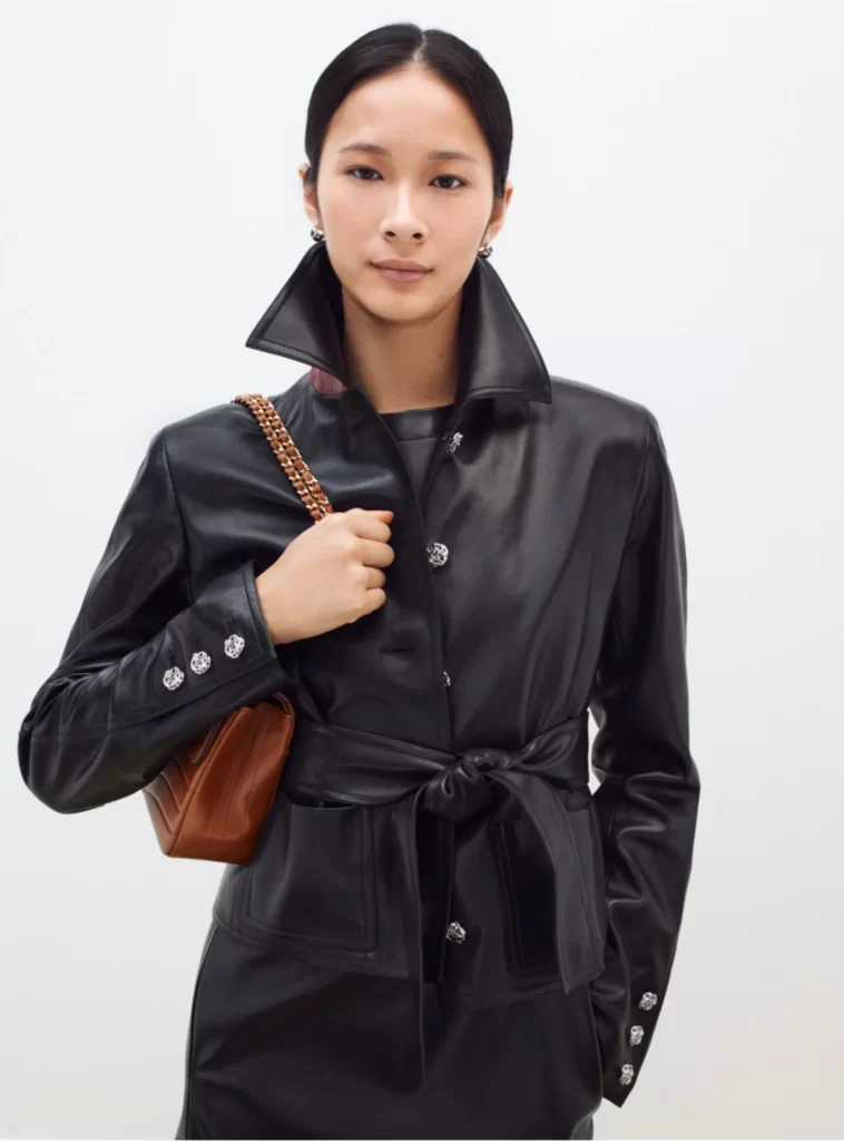 Chanel Fall Winter 2026 Pre Collection Look 27 Jacket and Trousers Black Runway Photography