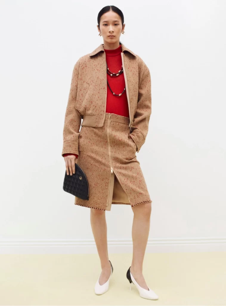 Chanel Fall Winter 2026 Pre Collection Look 23 Tweed Jacket and Skirt Brown and Red Runway Photography