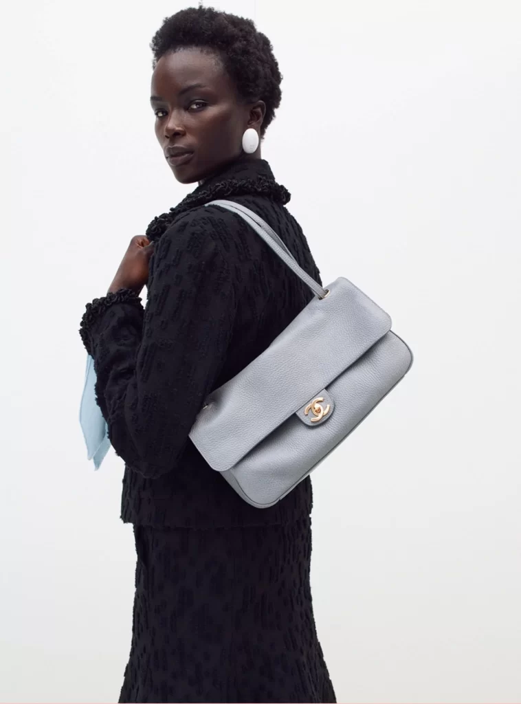 Chanel Fall Winter 2026 Pre Collection Look 32 Tweed Jacket and Skirt Black and Blue Runway Photography