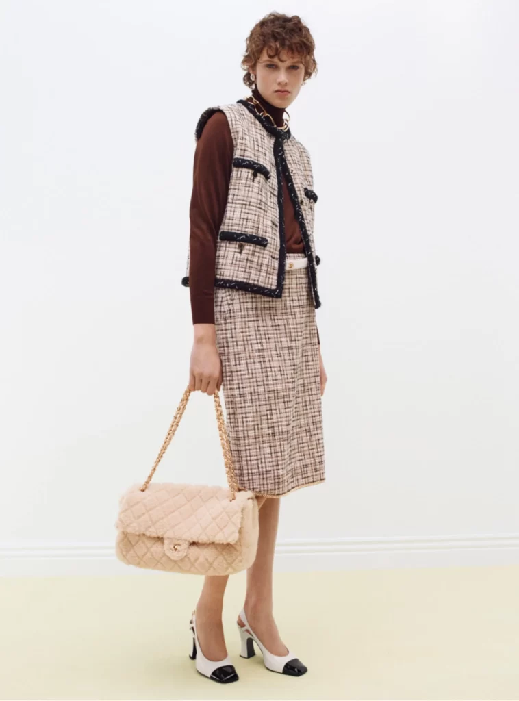 Chanel Fall Winter 2026 Pre Collection Look 50 Tweed Jacket and Skirt Beige and Black Runway Photography