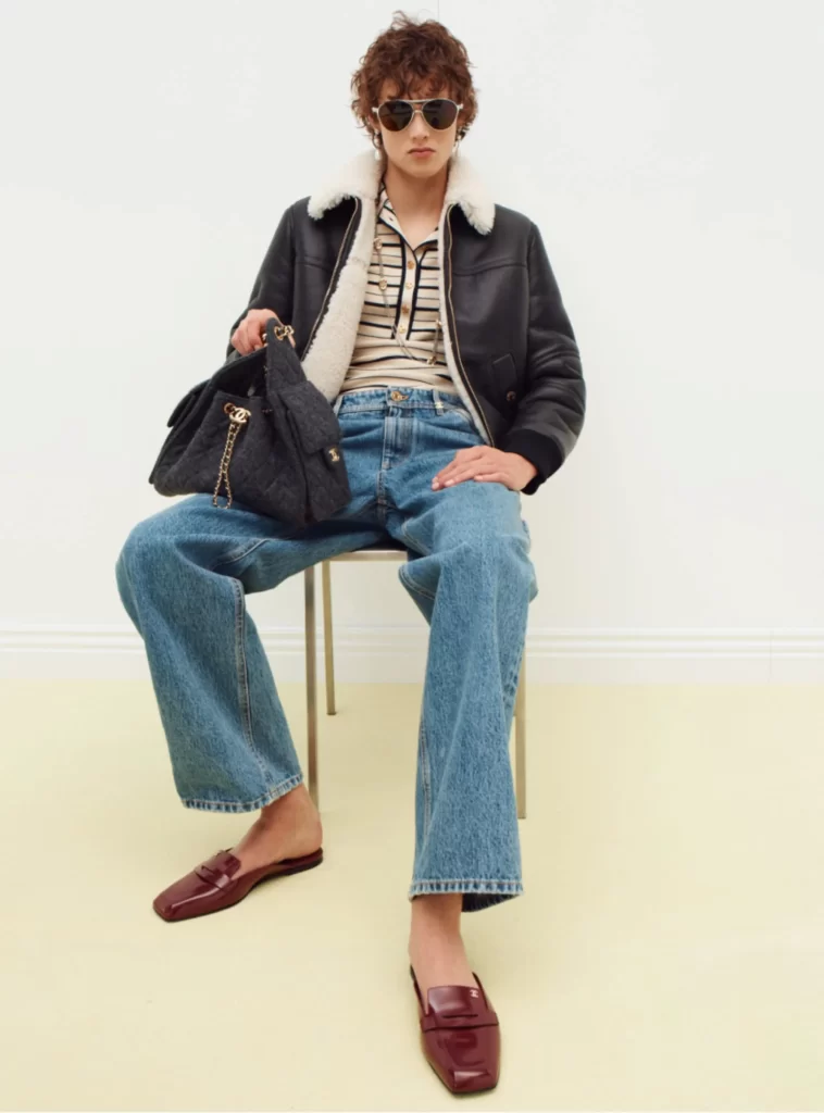 Chanel Fall Winter 2026 Pre Collection Look 25 Tweed Jacket and Trousers Black and Blue Runway Photography