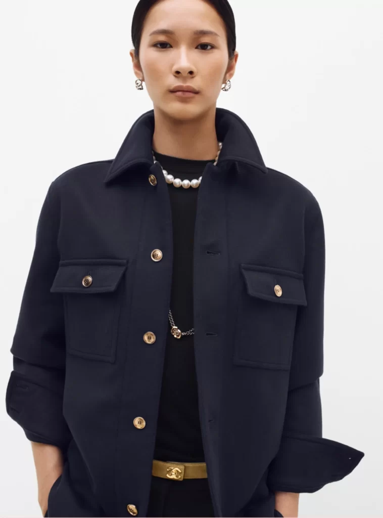 Chanel Fall Winter 2026 Pre Collection Look 46 Tweed Jacket and Trousers Navy Blue and Gold Runway Photography