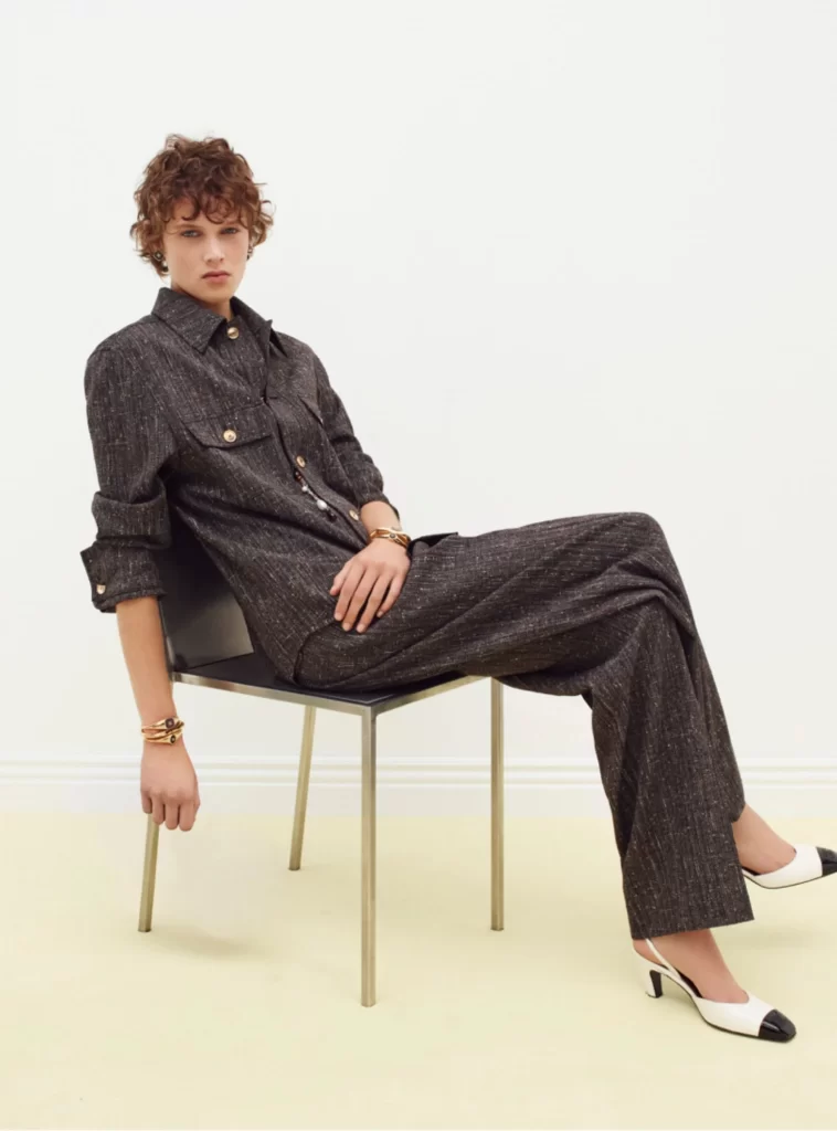 Chanel Fall Winter 2026 Pre Collection Look 55 Tweed Jacket and Trousers Black and Grey Runway Photography
