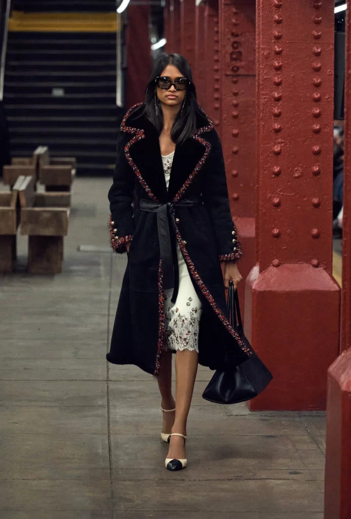 Chanel Metiers d’Art 2026 Look 55 Jacket and Skirt Black and White Runway Photography