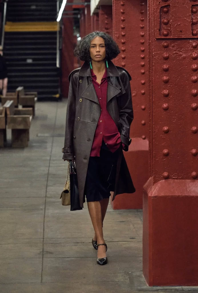 Chanel Metiers d’Art 2026 Look 6 Jacket and Skirt Brown and Maroon Runway Photography