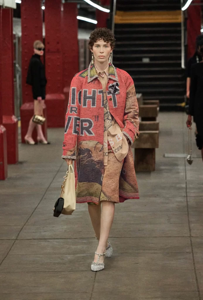 Chanel Metiers d’Art 2026 Look 66 Jacket and Skirt Red and Beige Runway Photography
