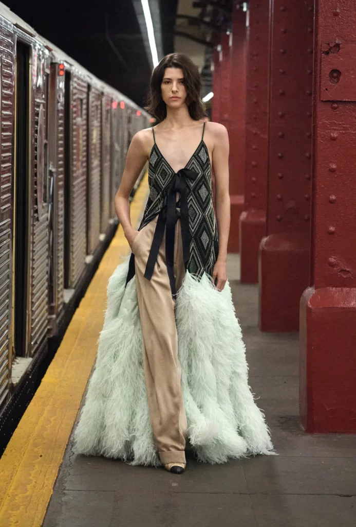 Chanel Metiers d’Art 2026 Look 77 Jumpsuit Black and Green Runway Photography