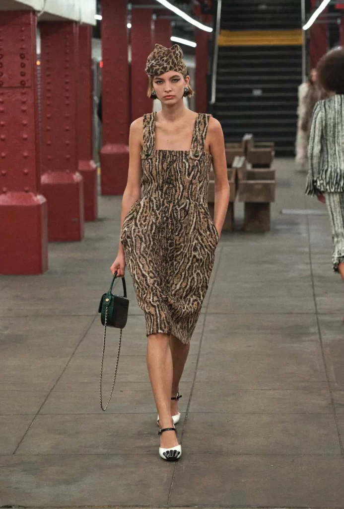 Chanel Metiers d’Art 2026 Look 33 Long Dress Brown and Black Runway Photography