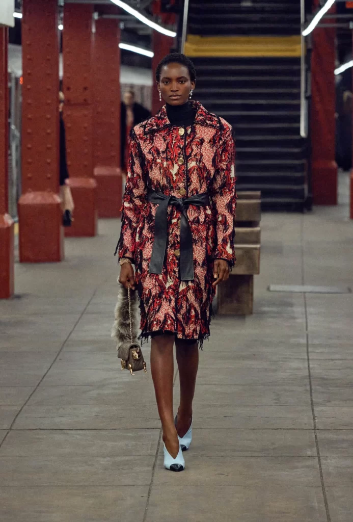 Chanel Metiers d’Art 2026 Look 58 Long Dress Red and Black Runway Photography