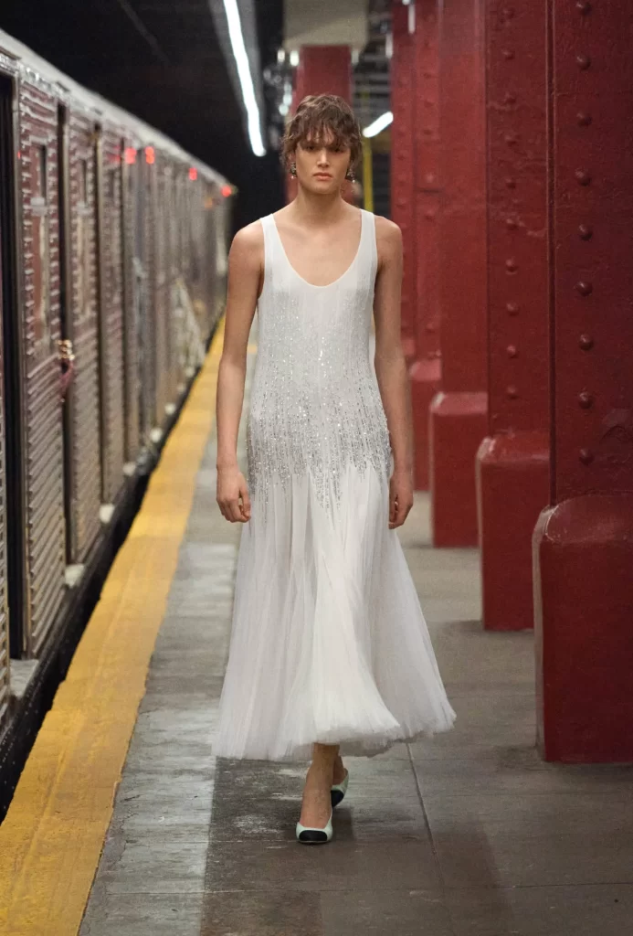 Chanel Metiers d’Art 2026 Look 81 Long Dress White Runway Photography