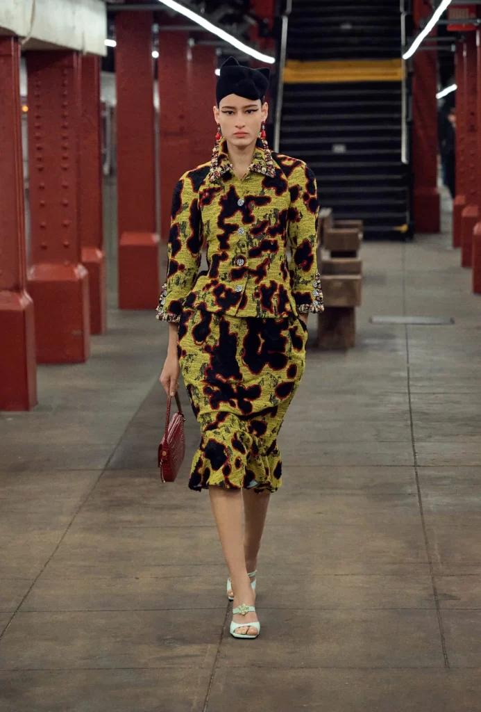 Chanel Metiers d’Art 2026 Look 64 Top and Trousers Yellow and Black Runway Photography