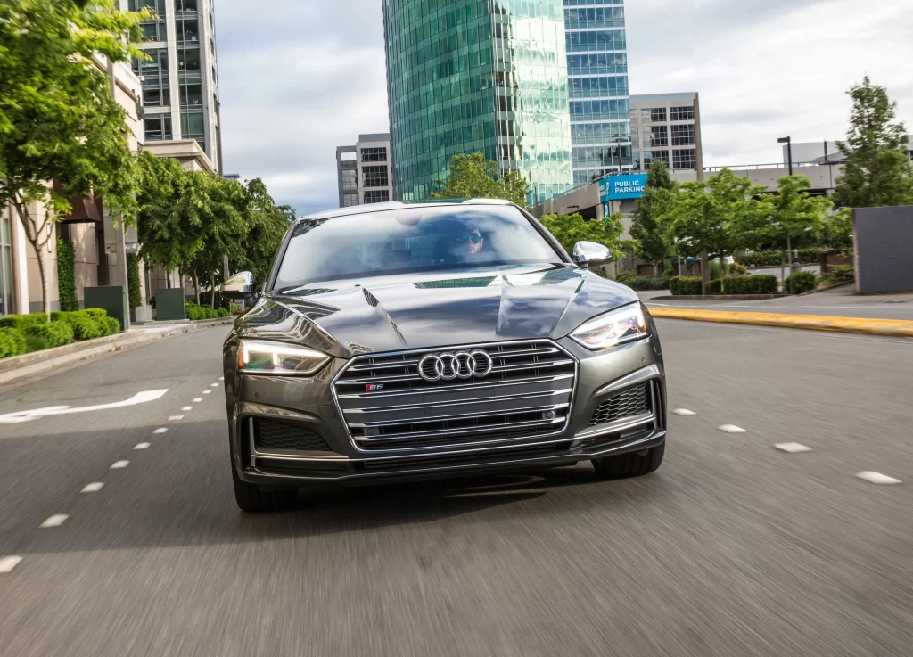 Gray Audi Sedan City Street Front View