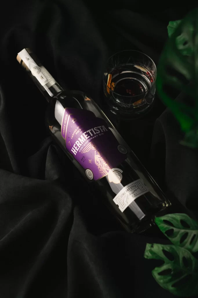 Hermetista Gin Bottle Dark Backdrop View