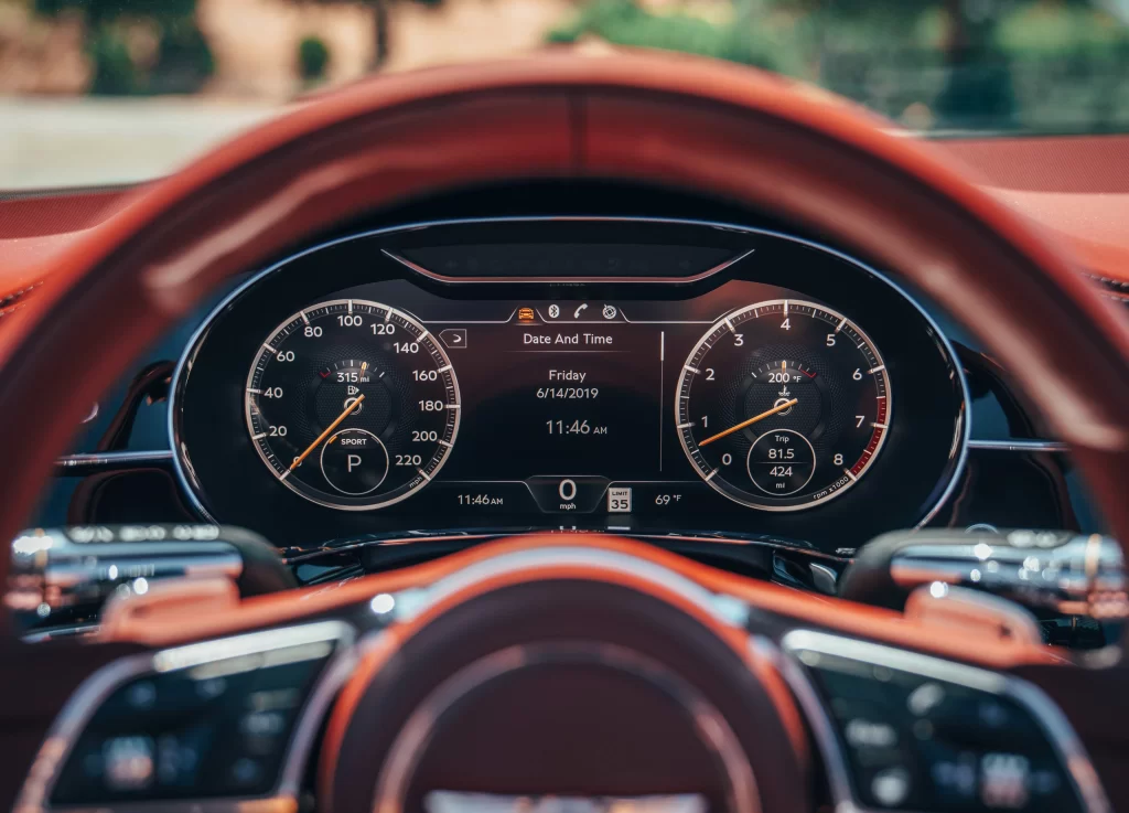 Luxury Sedan Red Gauge Dashboard Detail