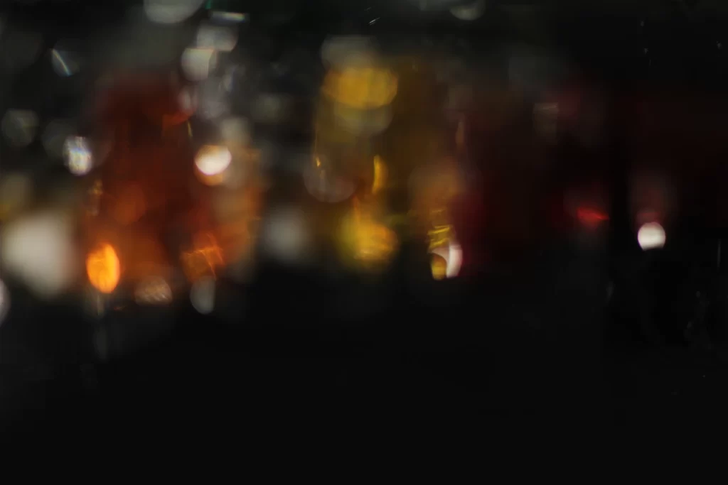 Orange Bokeh Dark Background