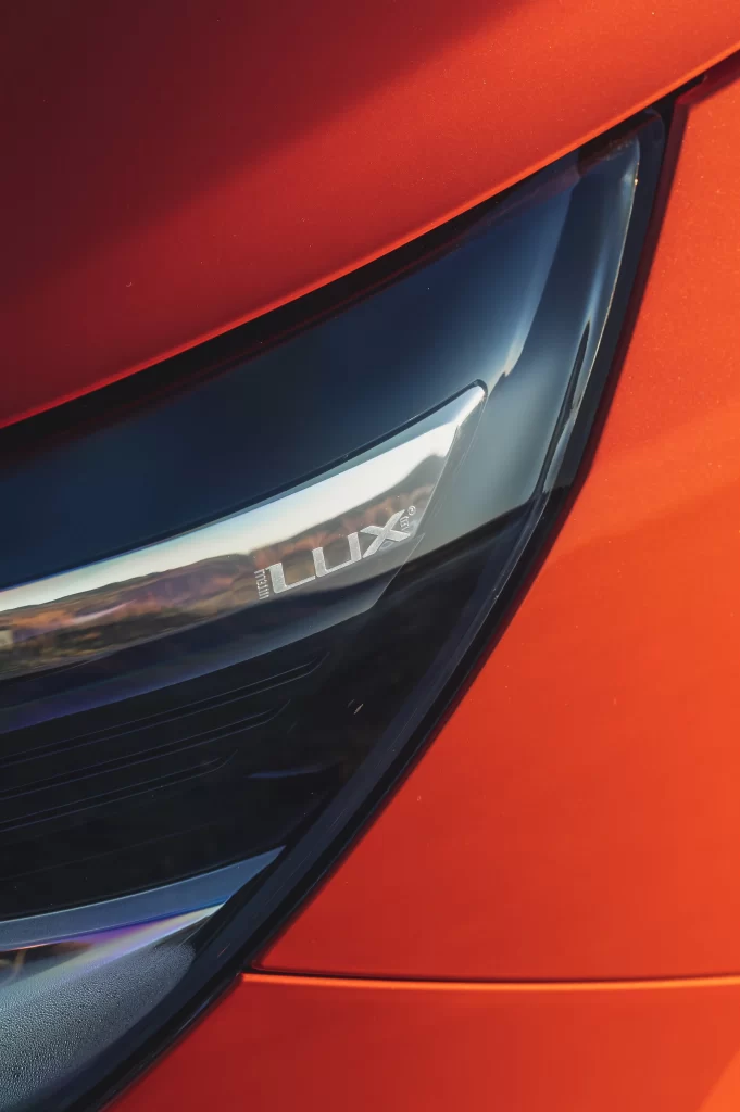 Red Car Headlight Luxe Trim Detail