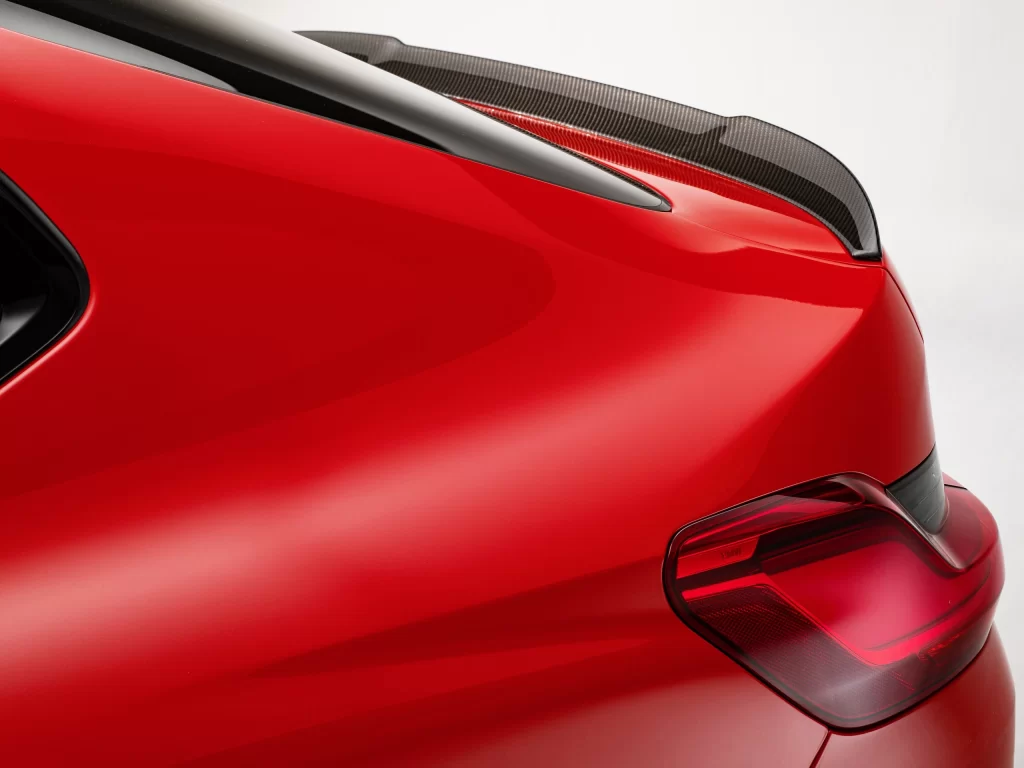 Red Hatchback Body Panel Close Up Detail